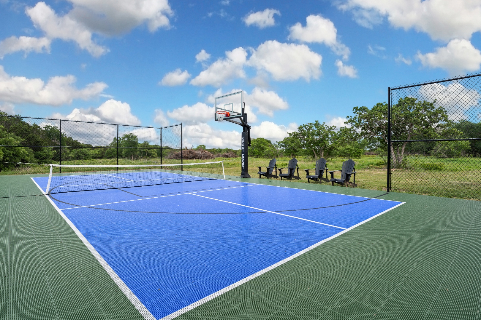 Pickleball and basketball court on property