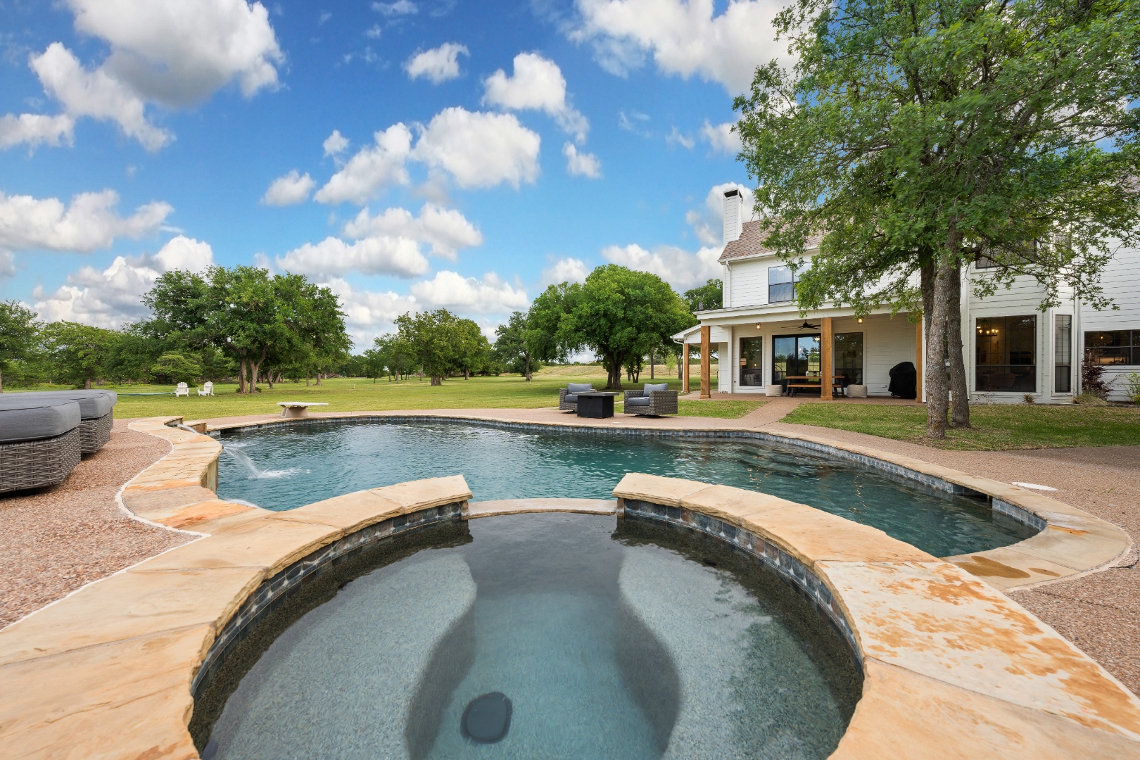 Sparkling pool and hot tub at Countryside Haven